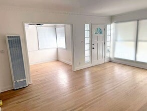 6143 W Olympic Blvd in Los Angeles, CA - Building Photo - Building Photo