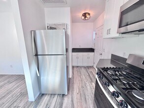 3774 S Gramercy Pl in Los Angeles, CA - Building Photo - Building Photo