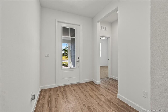 property at 14143 SW Safi Ter