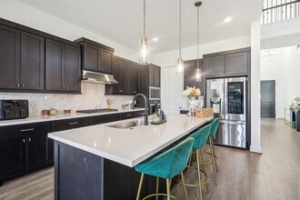 10715 Novy Grv Dr in Sienna, TX - Building Photo - Building Photo