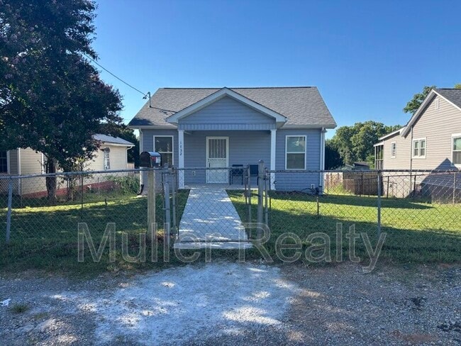 property at 1732 Jourolman Ave