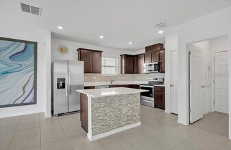 1140 Sugarwood St in Davenport, FL - Building Photo - Building Photo