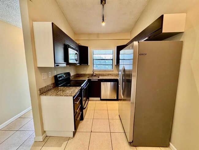 property at 11211 Royal Palm Blvd