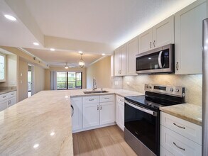 1101 Pinecrest Cir in Jupiter, FL - Building Photo - Building Photo