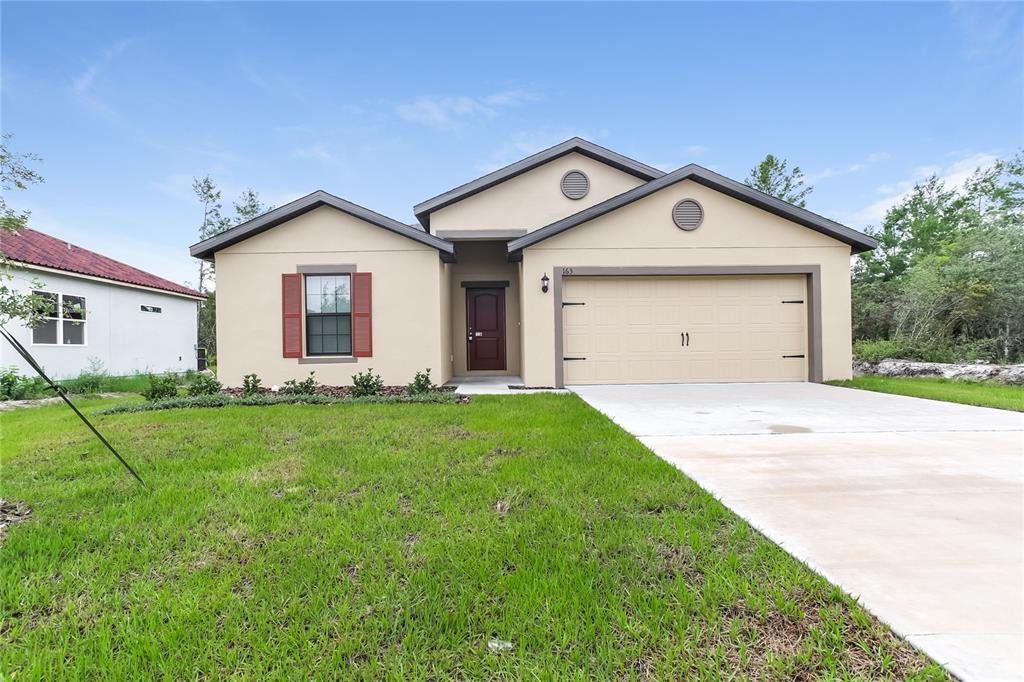 163 Violet Ct in Poinciana, FL - Building Photo
