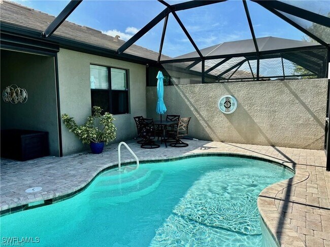 7627 Jacaranda Ln in Naples, FL - Building Photo - Building Photo