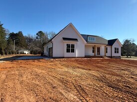 9715 Flowes Store Rd in Midland, NC - Building Photo