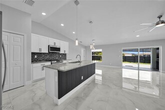 3095 NW 4th Pl in Cape Coral, FL - Building Photo - Building Photo