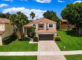 7701 NW 61st Terrace in Parkland, FL - Building Photo