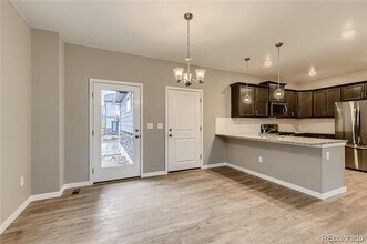 847 Quatar St in Aurora, CO - Building Photo - Building Photo