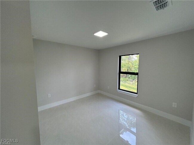 405-407 Chalet Ave S in Lehigh Acres, FL - Building Photo - Building Photo