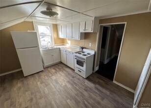 34 E 6th St in Oswego, NY - Building Photo - Building Photo