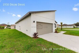 1930 Drum Dr in Poinciana, FL - Foto de edificio - Building Photo