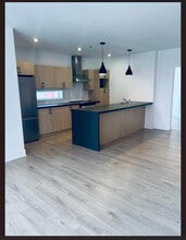 Le Centro in St-Constant, QC - Building Photo - Building Photo