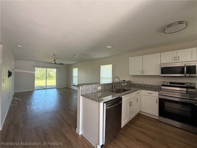 7039 San Benito Dr in Sebring, FL - Building Photo - Building Photo