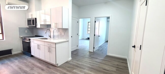 property at 30-56-56 12th St