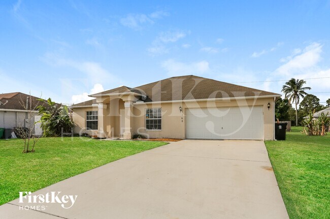 1168 SW Idol Ave in Port St. Lucie, FL - Building Photo - Building Photo