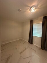 1427 E 76th St in Los Angeles, CA - Building Photo - Building Photo