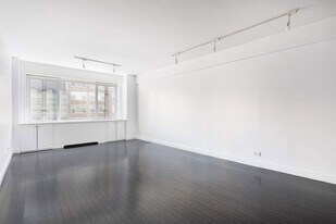 166 E 63rd St, Unit 7J in New York, NY - Building Photo