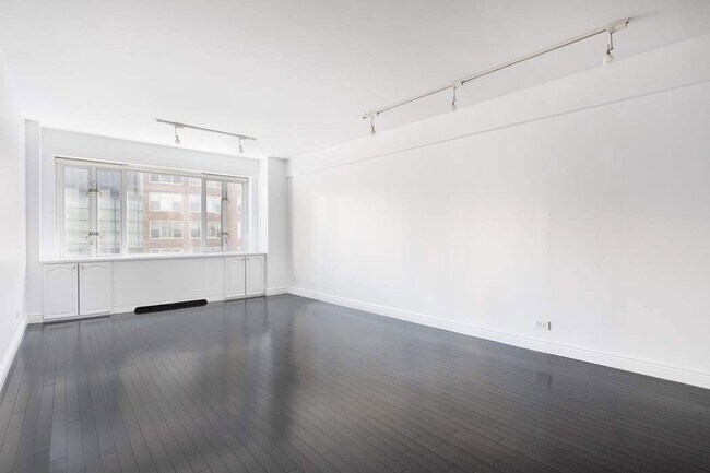 property at 166 E 63rd St