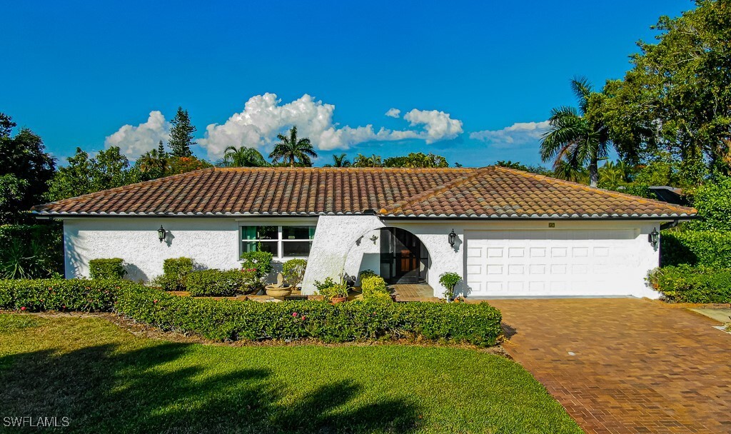 67 Pebble Beach Blvd in Naples, FL - Building Photo