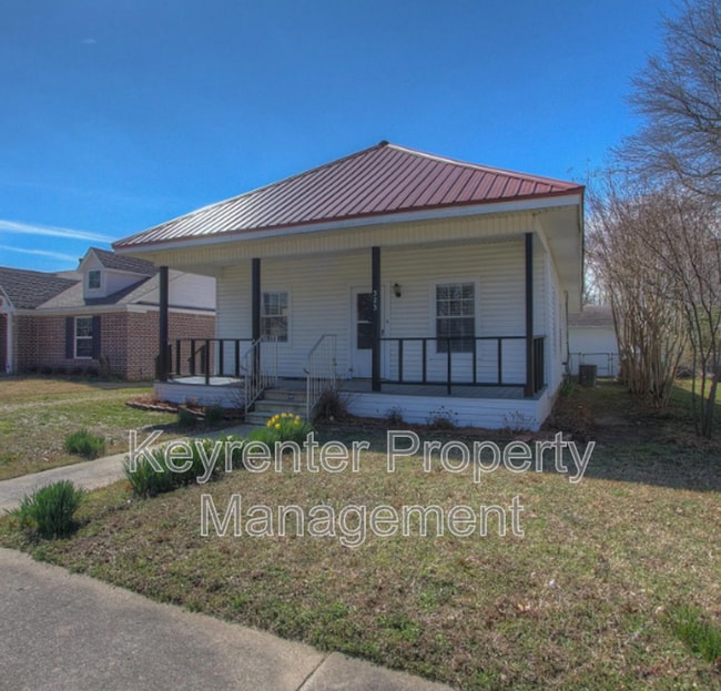 property at 323 E Will Rogers Blvd