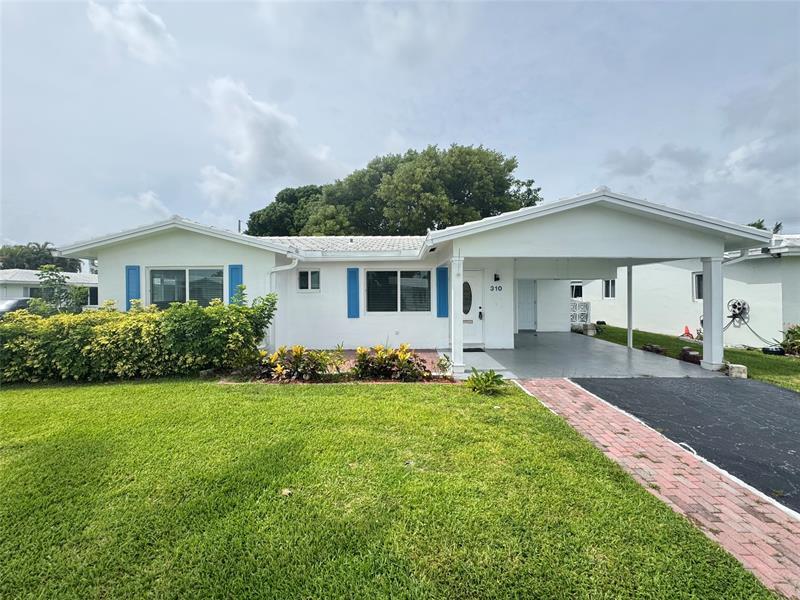 310 Leisure Blvd in Pompano Beach, FL - Building Photo
