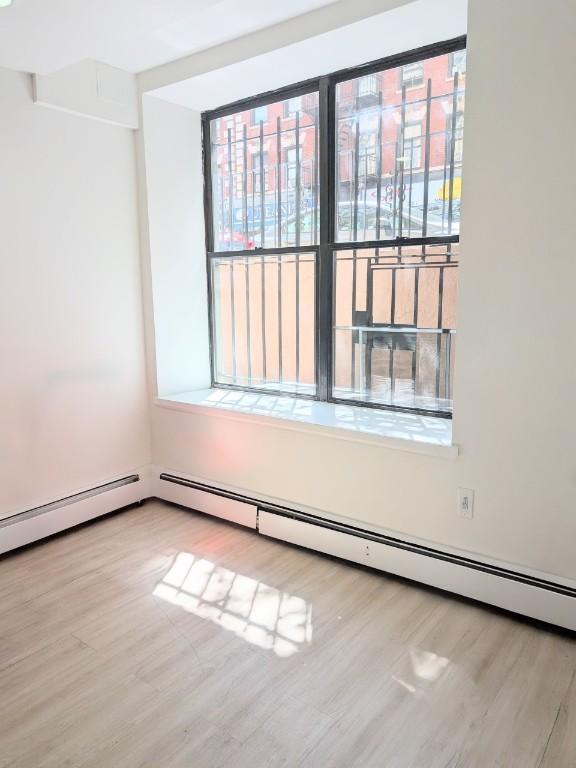 property at 235 E 13th St