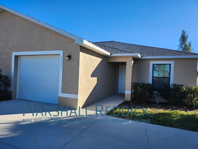 3313-3315 SW 15th Pl in Cape Coral, FL - Foto de edificio - Building Photo