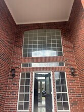 201 Pebble Springs Ln in Cleveland, TX - Building Photo - Building Photo