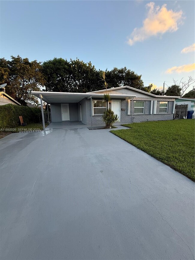 property at 1600 W 14th St