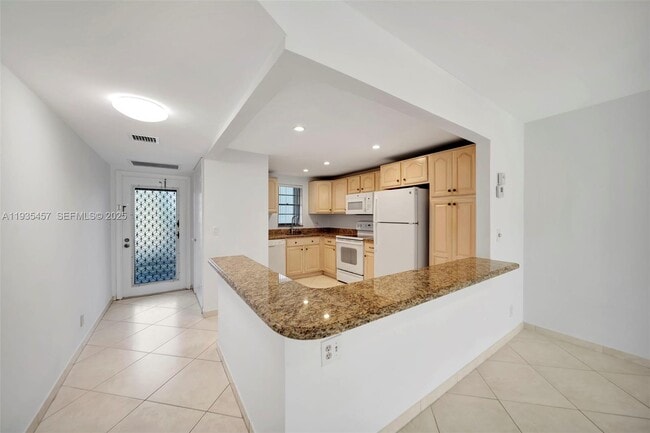 2450 Deer Creek Country Club Blvd in Deerfield Beach, FL - Building Photo - Building Photo