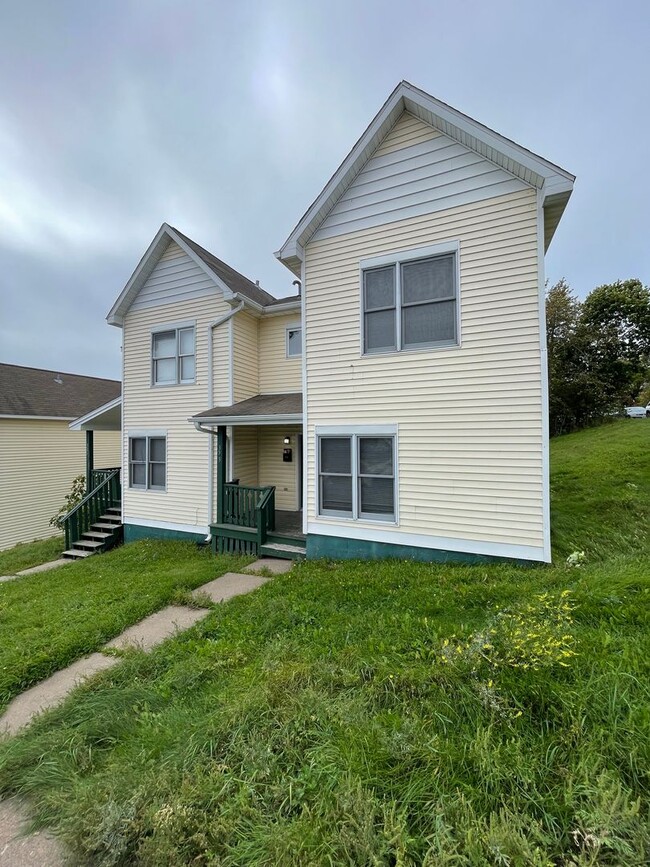 property at 321-323 N 3rd Ave W