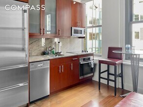 80 John St, Unit 16D in New York, NY - Building Photo - Building Photo