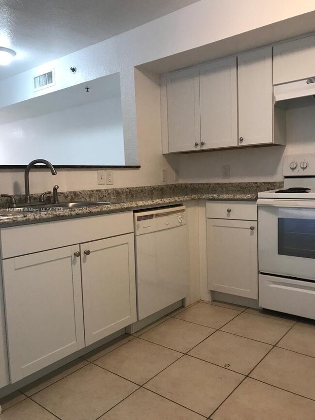 property at 13800 NE 3rd Ct