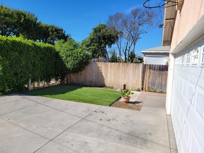 property at 10320 S Grevillea Ave