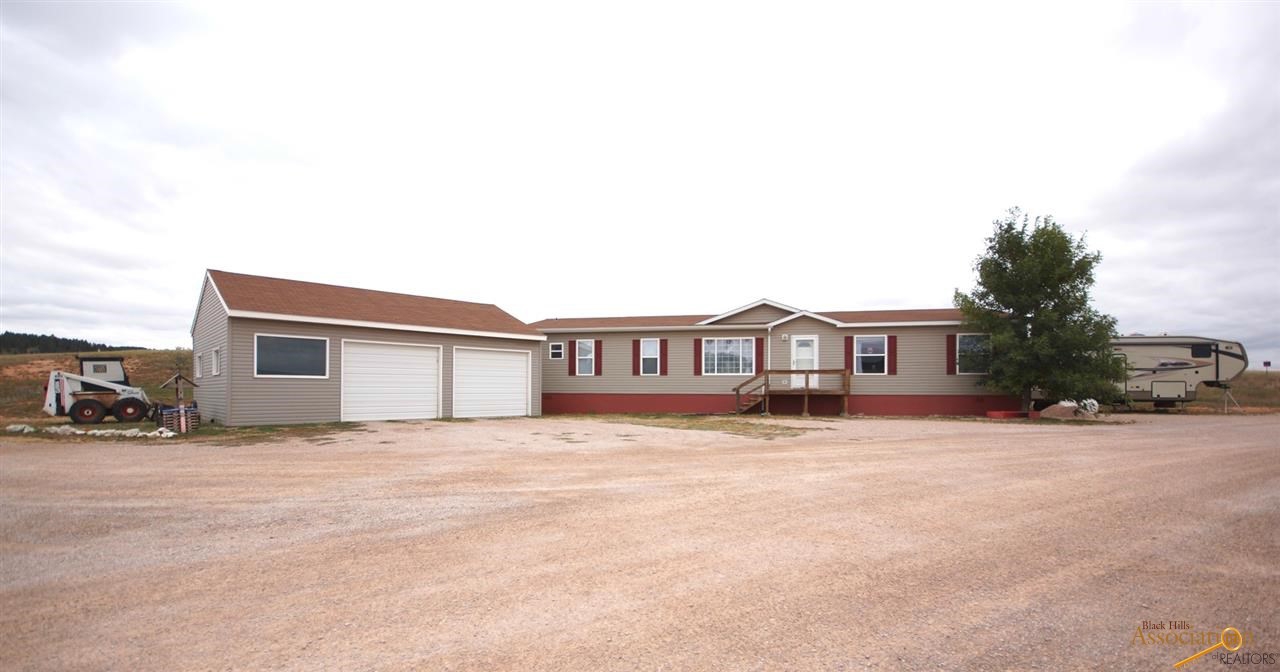 9484 Three Flags Ln in Black Hawk, SD - Building Photo