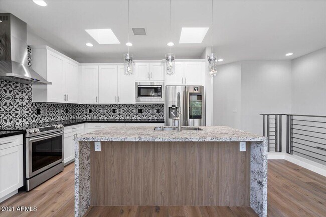 property at 1214 W 5th St
