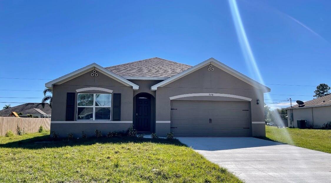 978 SW Longfellow Rd in Port St. Lucie, FL - Building Photo