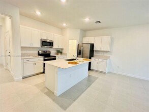 6949 Harbours Edge Ave in Greenacres, FL - Building Photo - Building Photo