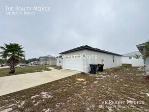 119 Lily Ln in Poinciana, FL - Building Photo - Building Photo