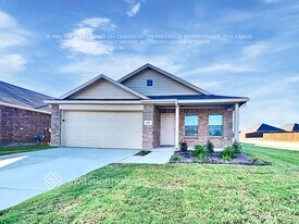 1009 Wildflower St in Ennis, TX - Building Photo