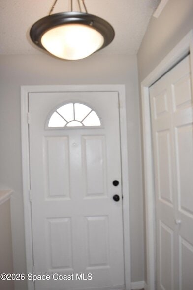 482 Tuloma Ave SW in Palm Bay, FL - Foto de edificio - Building Photo