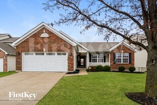 14 Rivermeadows Dr in Florissant, MO - Building Photo