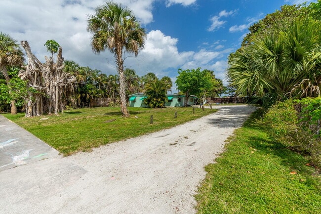 property at 4943 SE Flounder Ave