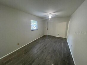 12140 Munbury Dr-Unit -4 in Dade City, FL - Building Photo - Building Photo