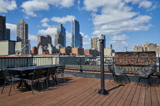 The Ecoliving House at 424 W 47th St in New York, NY - Building Photo - Building Photo