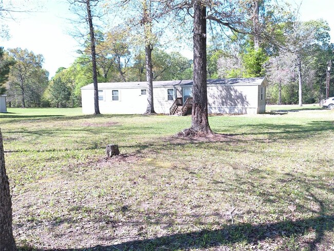 22 Chipmunk Trail in Shepherd, TX - Building Photo - Building Photo