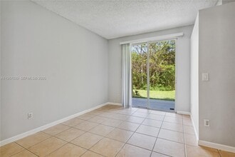 5758 NW 48th Ave in Coconut Creek, FL - Building Photo - Building Photo