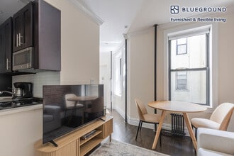 239 Elizabeth St in New York, NY - Building Photo - Building Photo